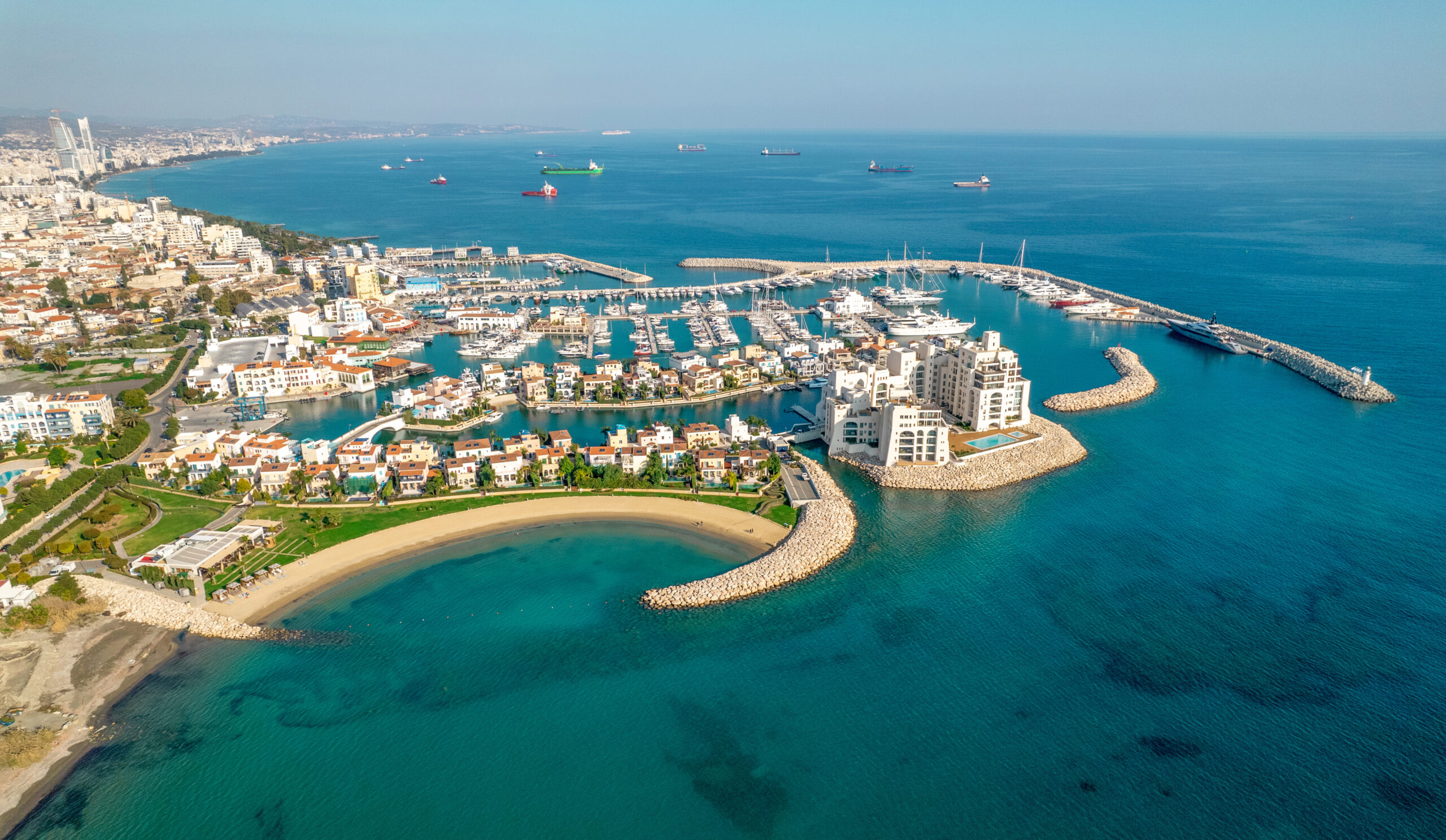 Marina beach cove with breakwaters in Limassol