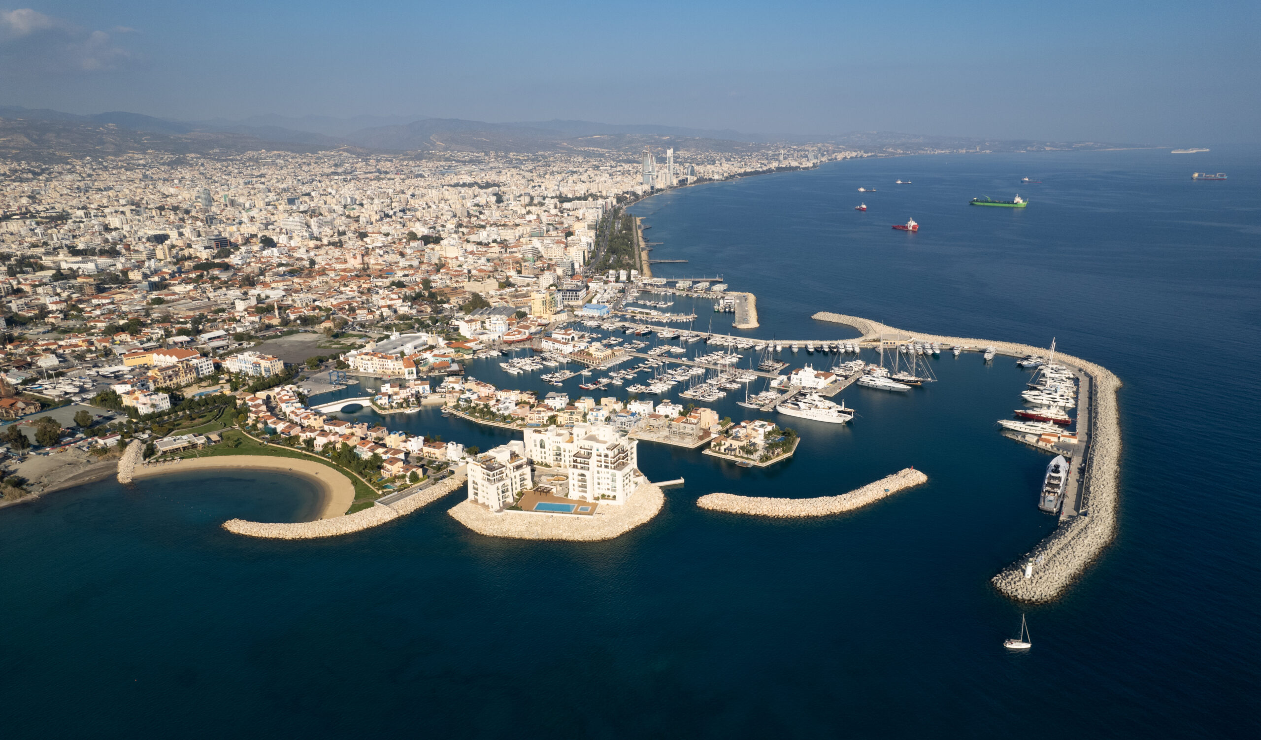 Aerial view of a yacht marina and coastline in Limassol, Cyprus